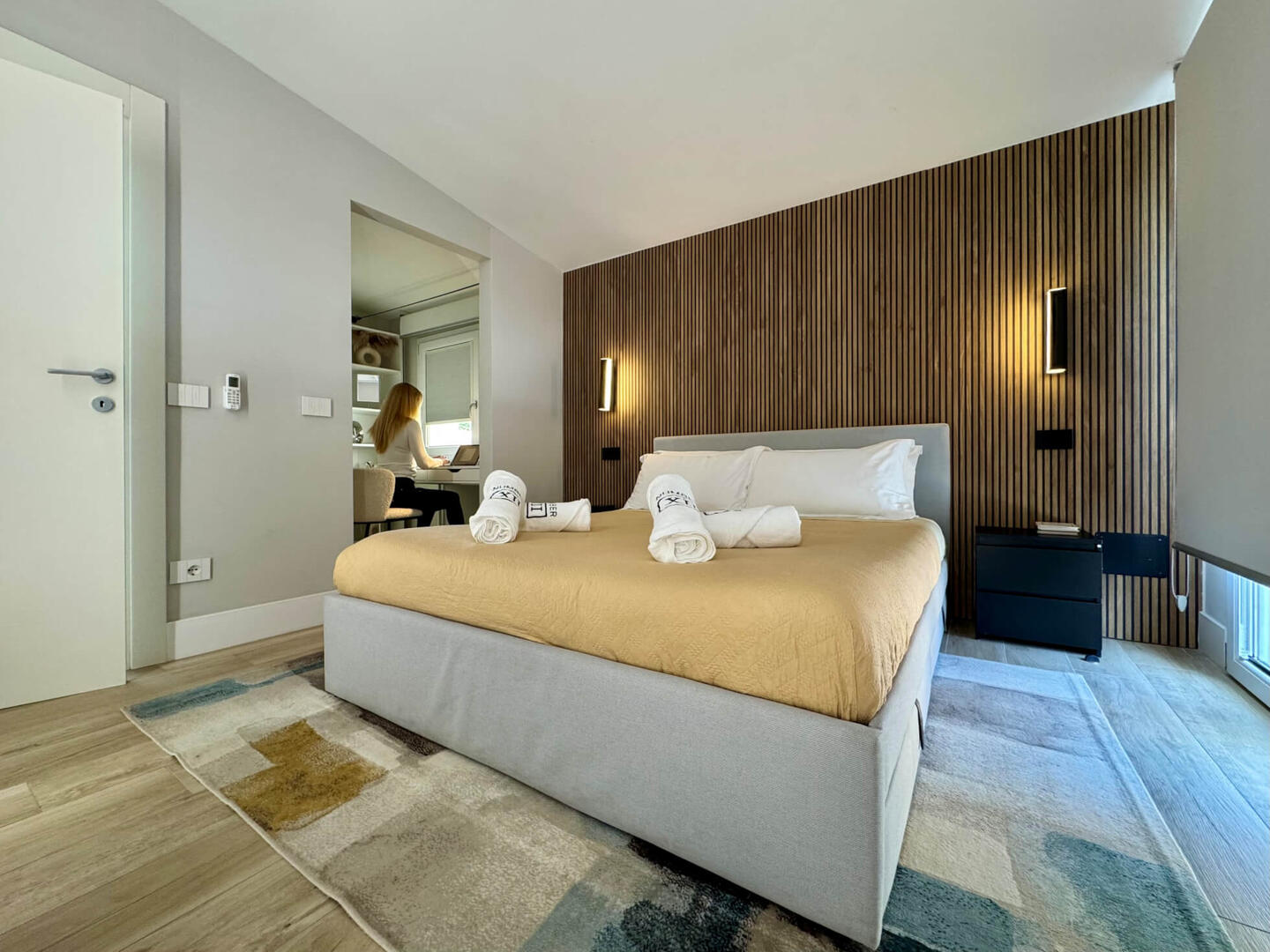 Separate walk-in closet and working desk/vanity, connected to the master bedroom.